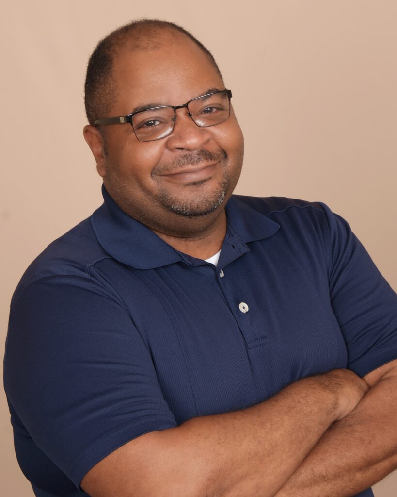 A headshot of Allen Hillery, this month's Public Interest Technologist of the Month.